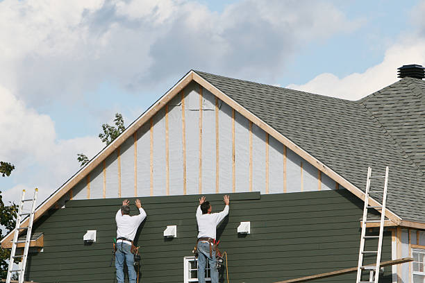 Professional Siding technician working in Westchester, IL